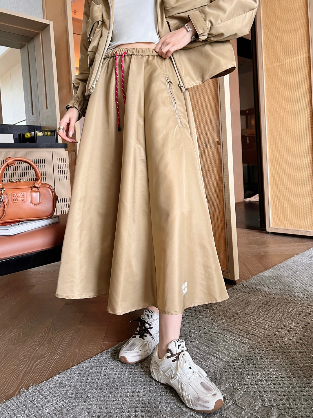 M*u 25ss tech canvas flared skirt