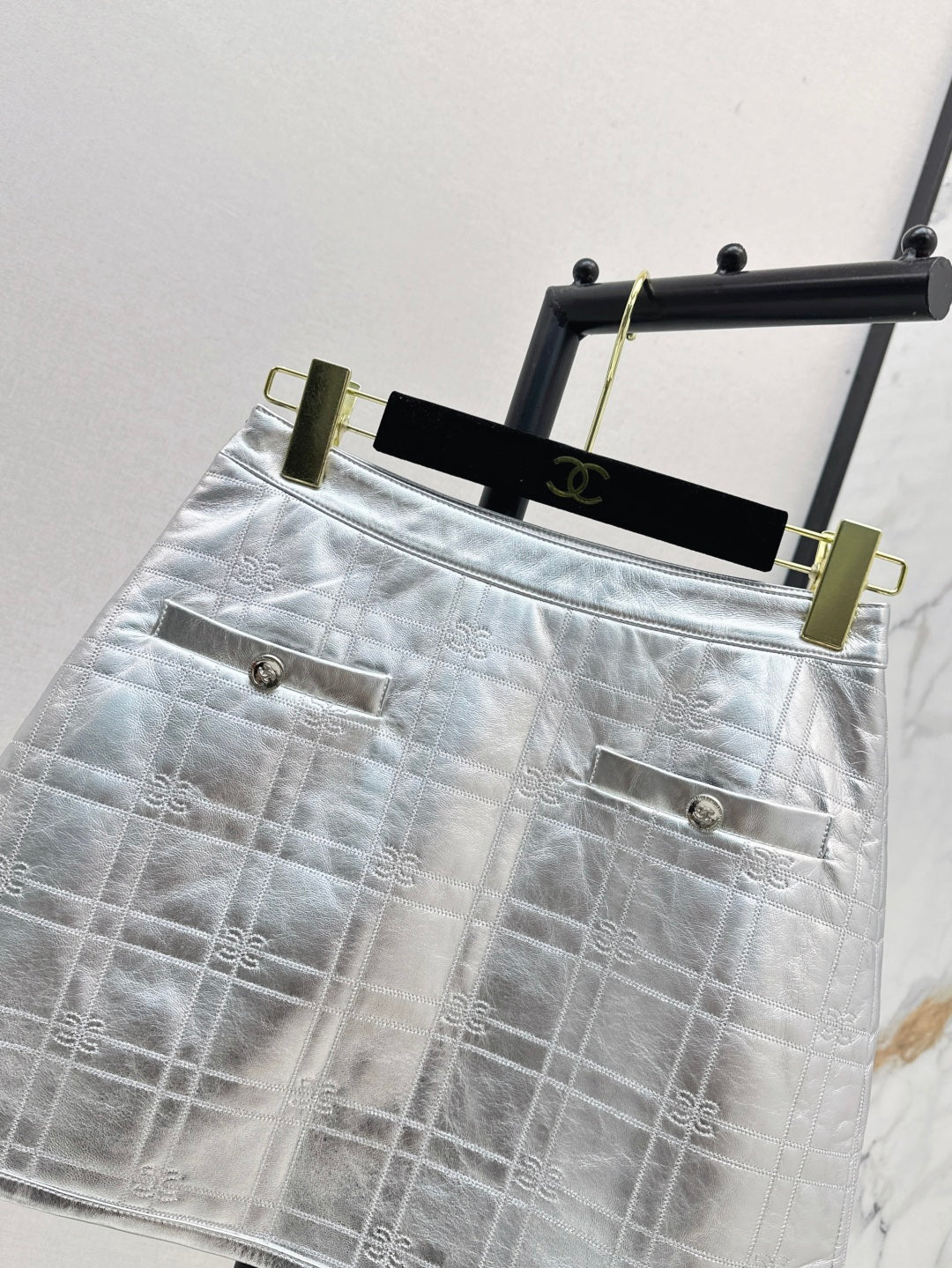 C*nel embossed check leather miniskirt