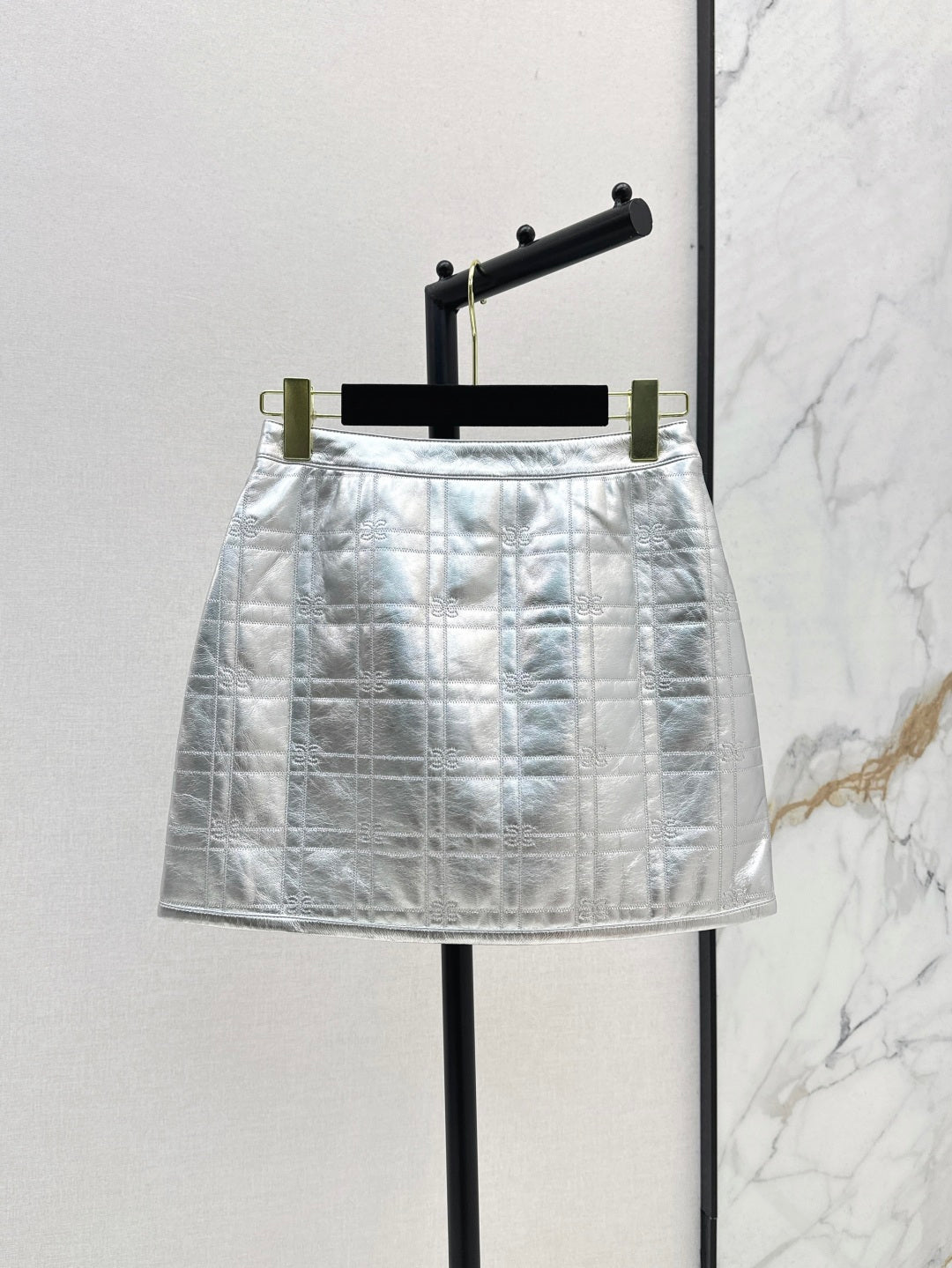 C*nel embossed check leather miniskirt