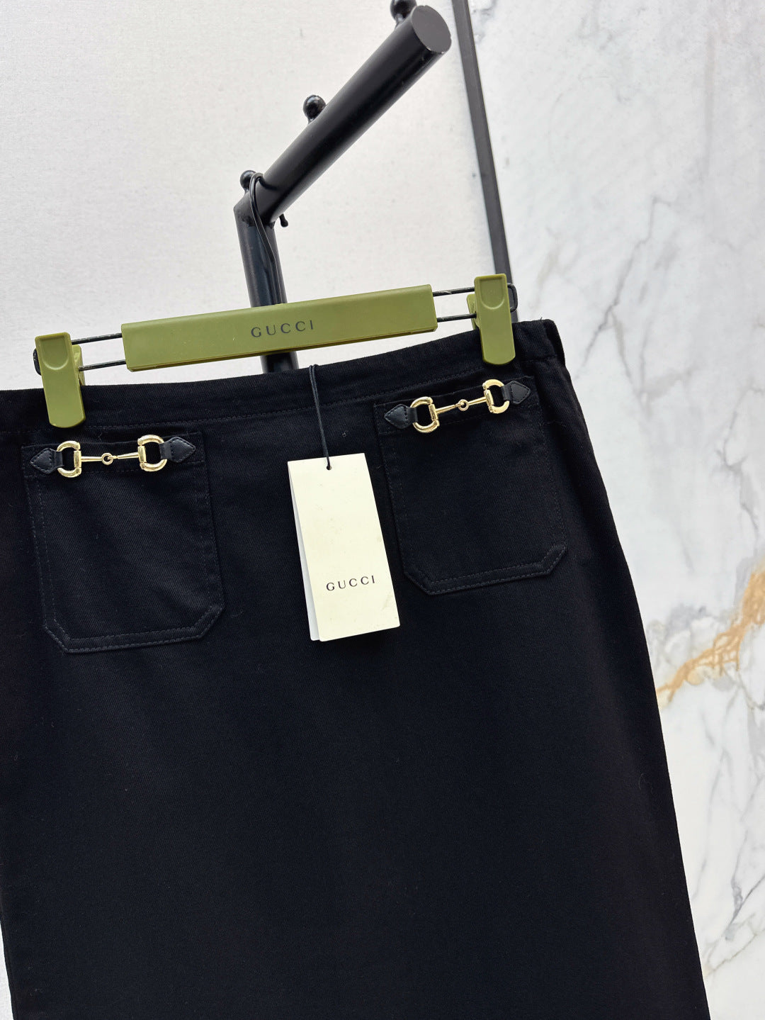 Gu* 25ss denim skirt with horsebit