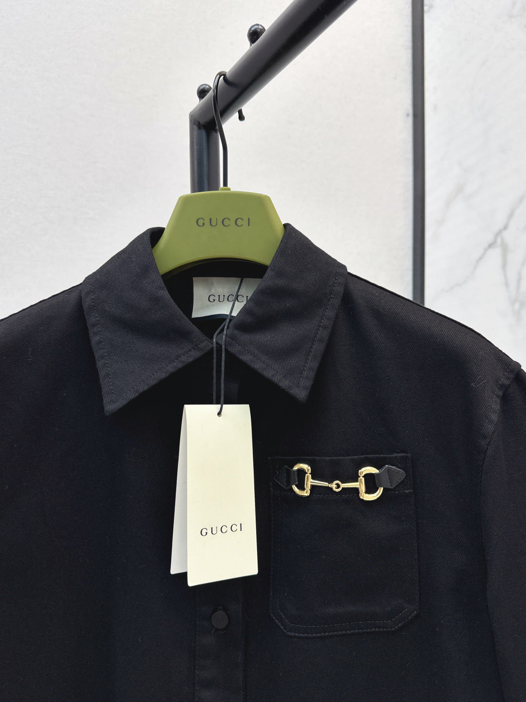 Gu* denim jumpsuit with horsebit