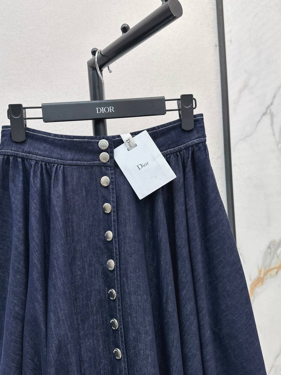 D*r 25ss pleated denim skirt with snaps