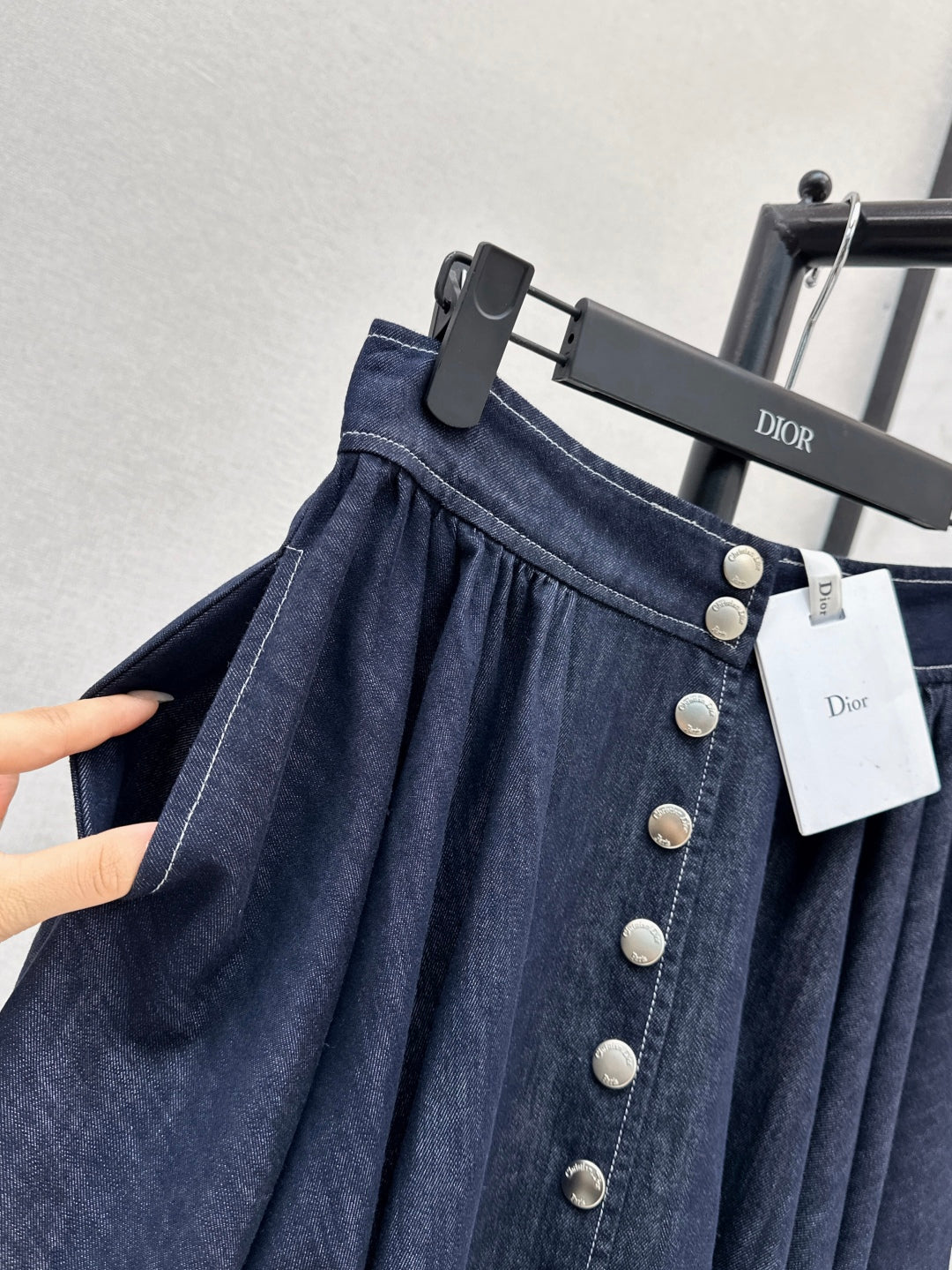 D*r 25ss pleated denim skirt with snaps