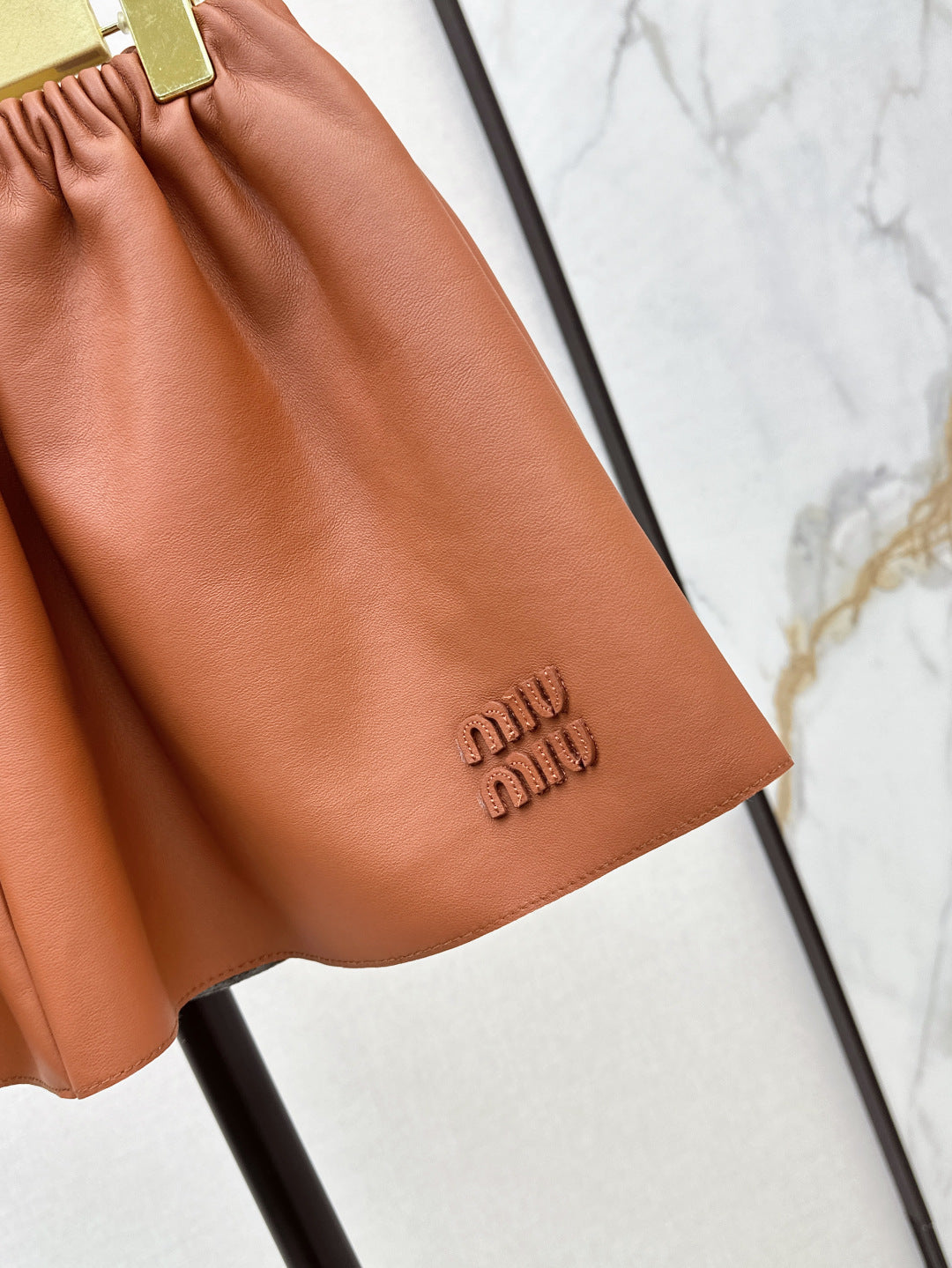 M*u 25ss nappa leather miniskirt