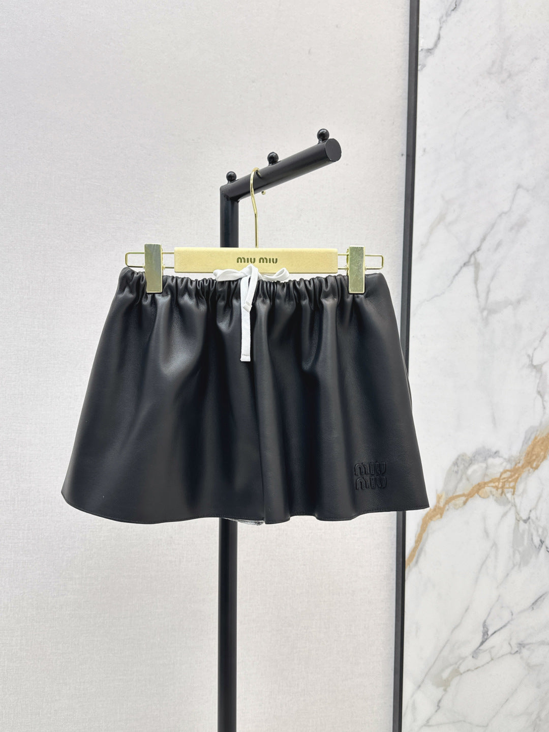 M*u 25ss nappa leather miniskirt