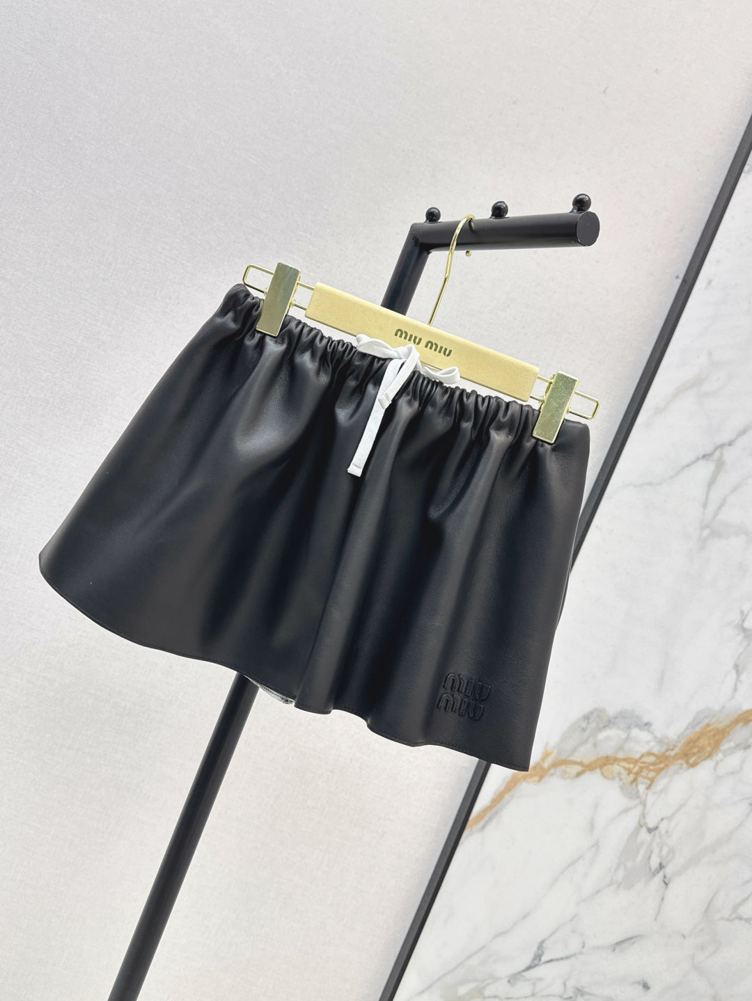 M*u 25ss nappa leather miniskirt