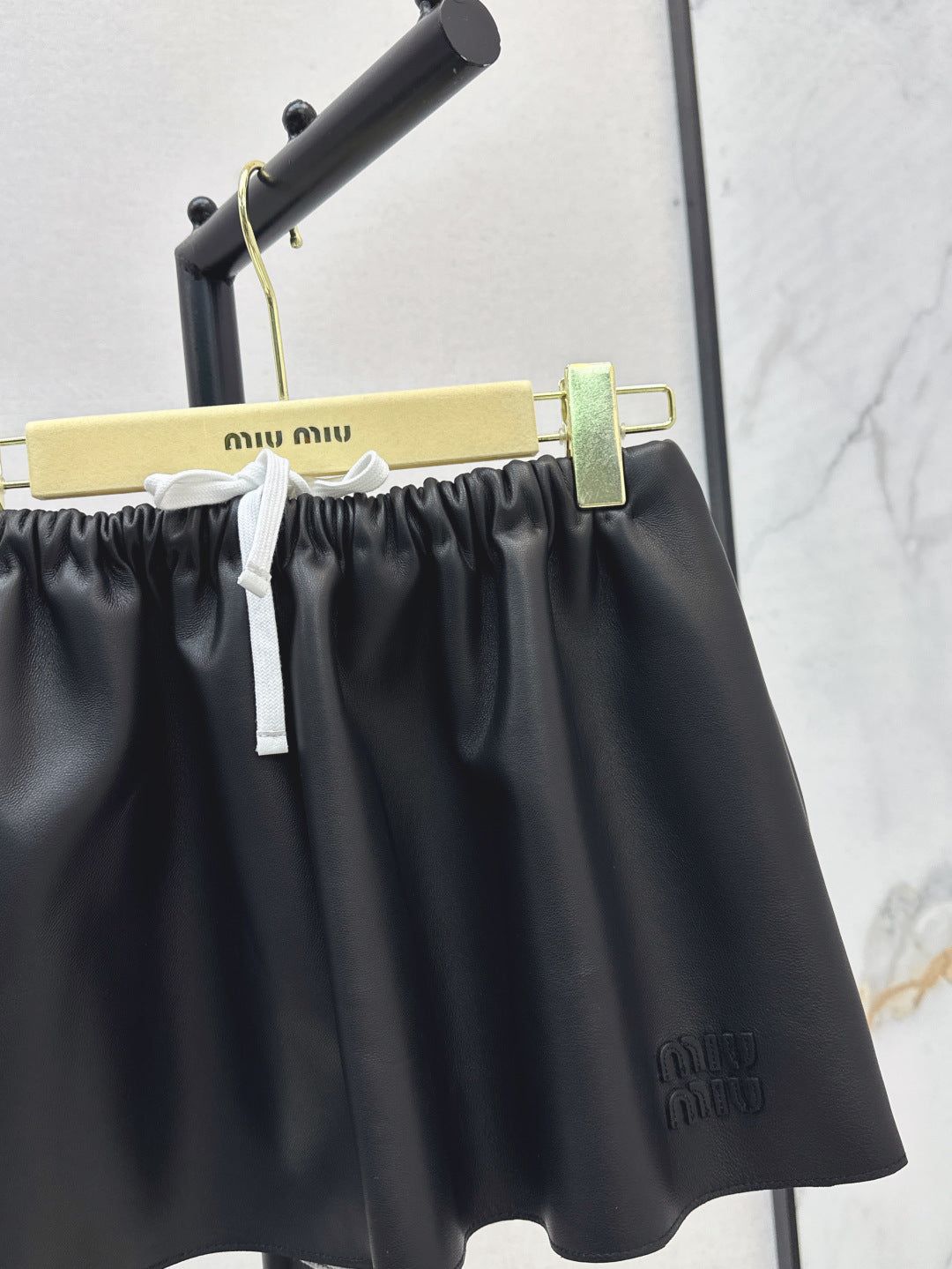 M*u 25ss nappa leather miniskirt