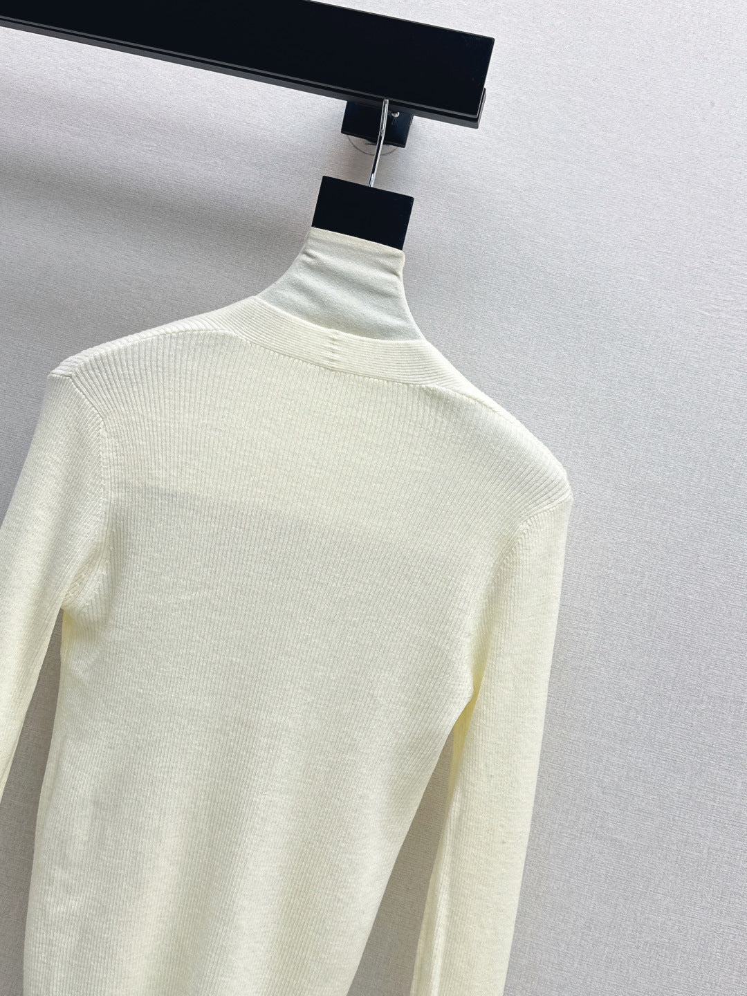M*u 25fw wool sweater