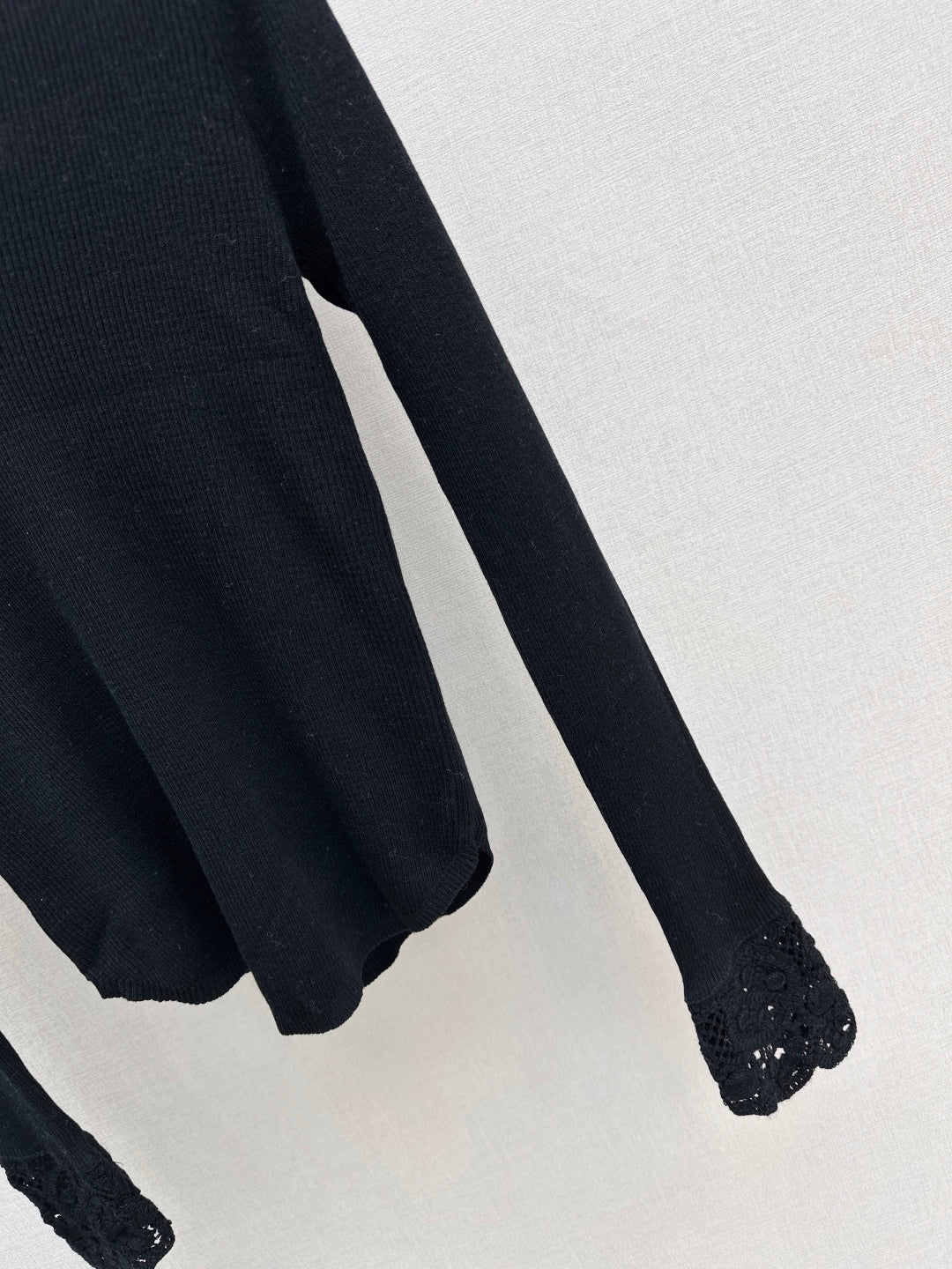 M*u 25fw wool sweater