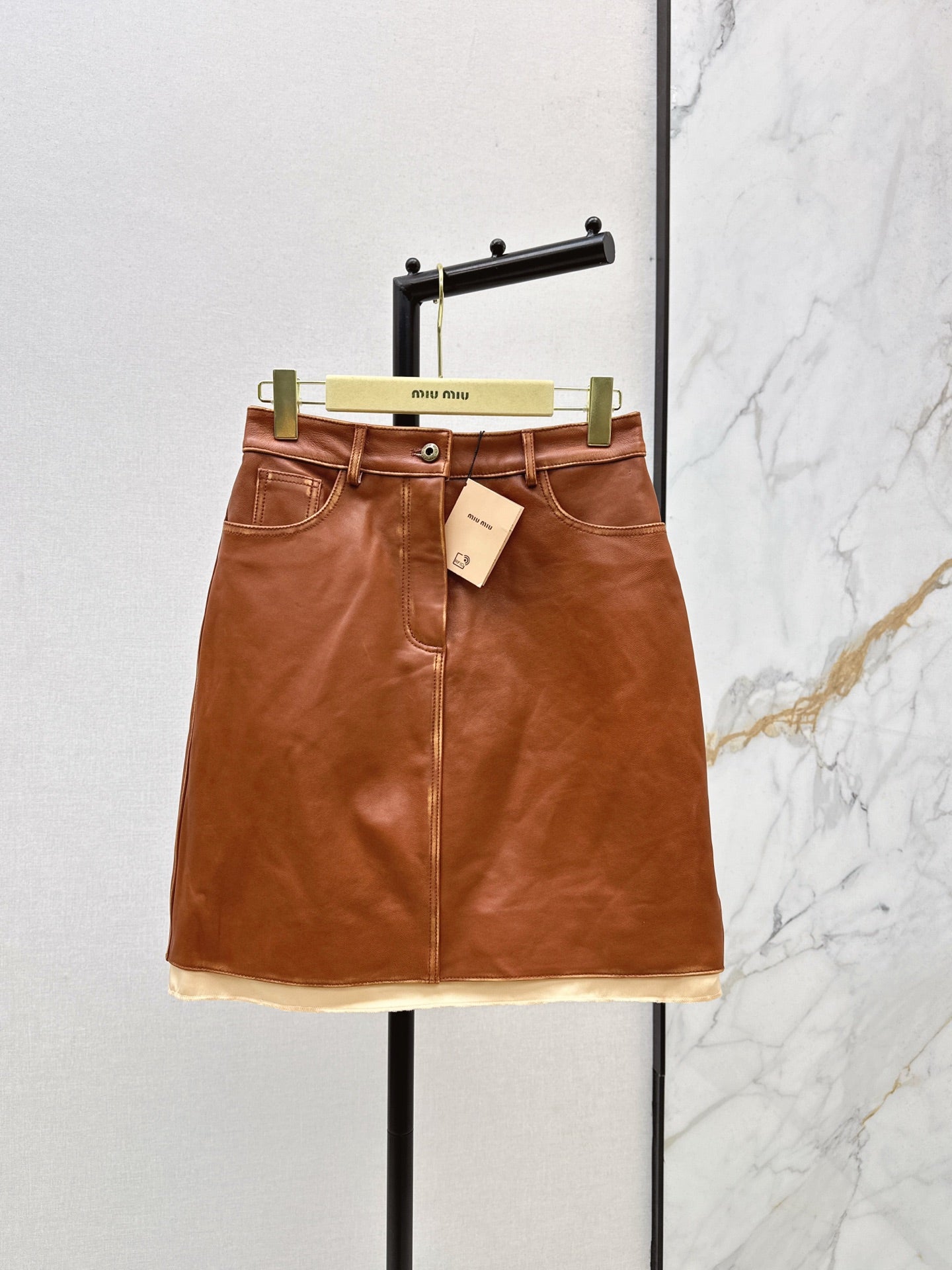 M*u 25fw leather skirt