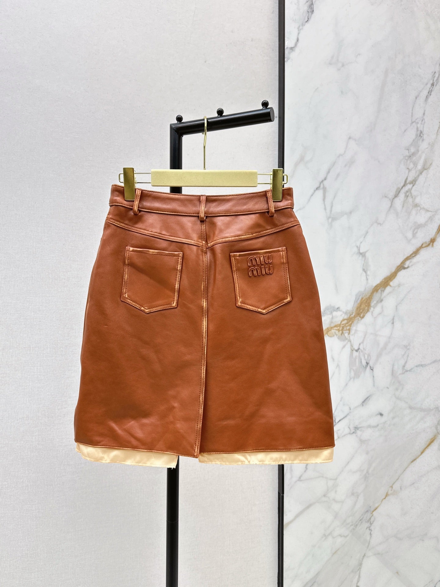 M*u 25fw leather skirt