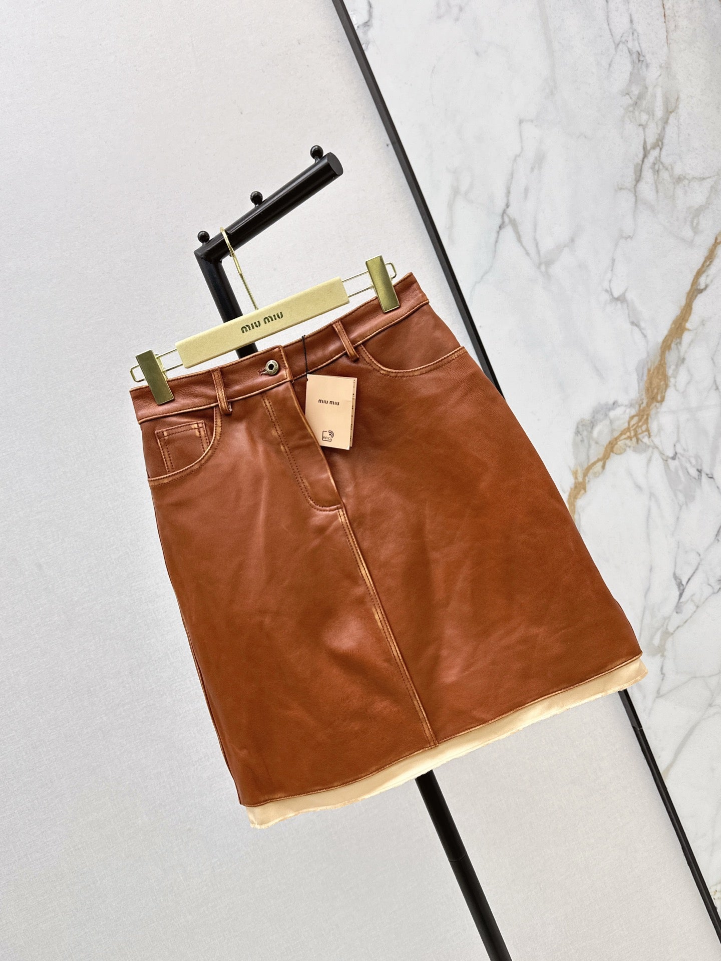 M*u 25fw leather skirt