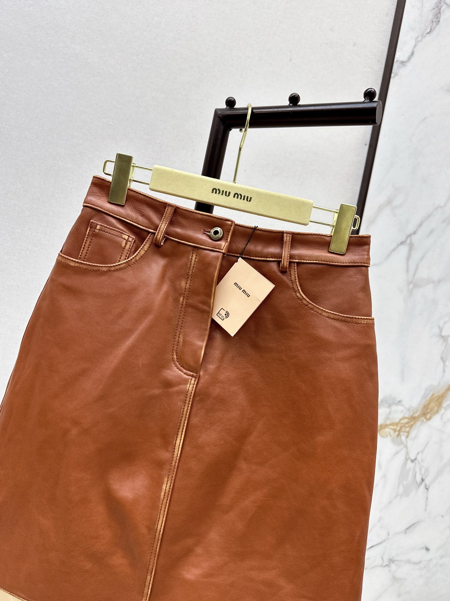 M*u 25fw leather skirt