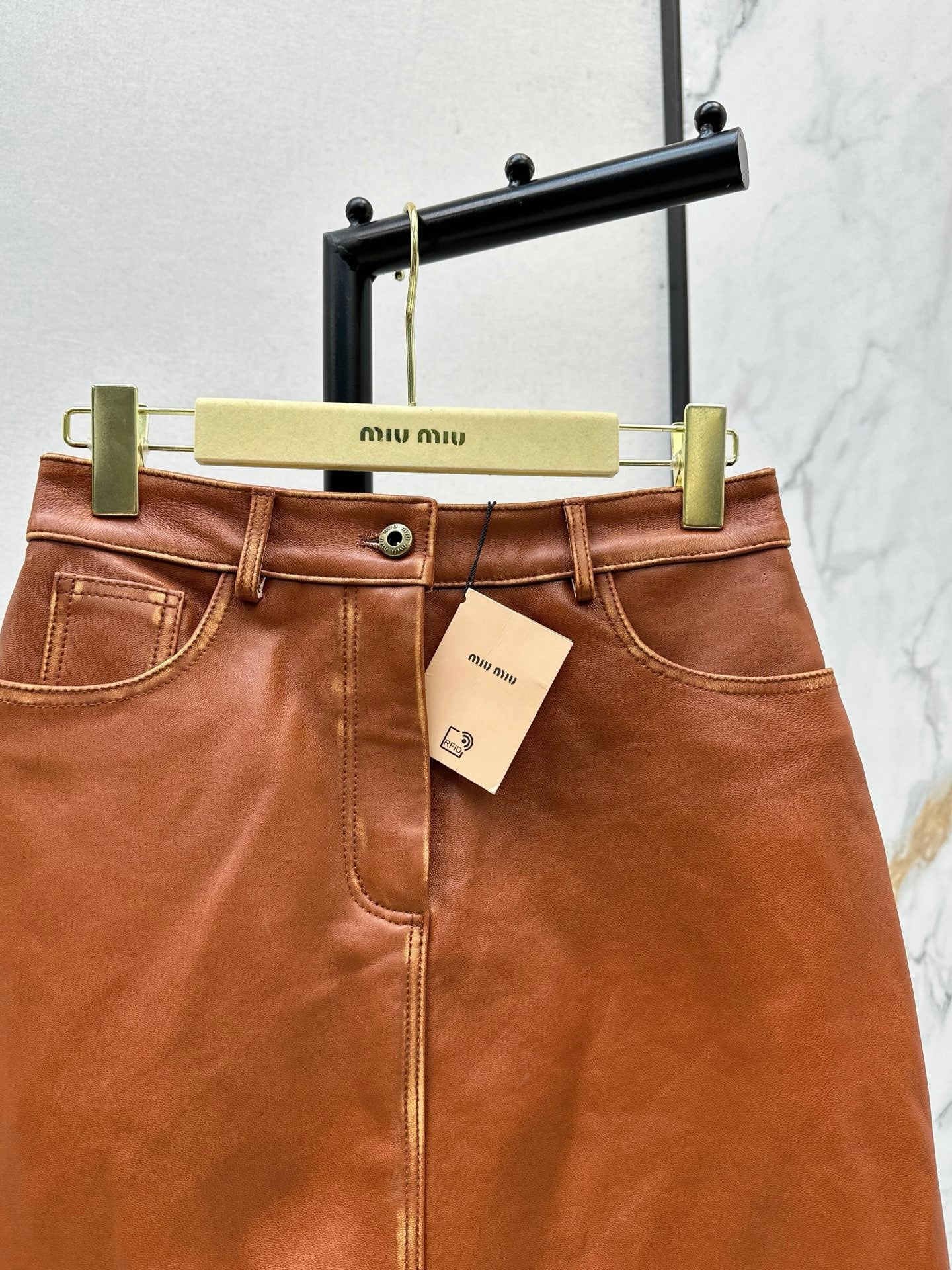 M*u 25fw leather skirt