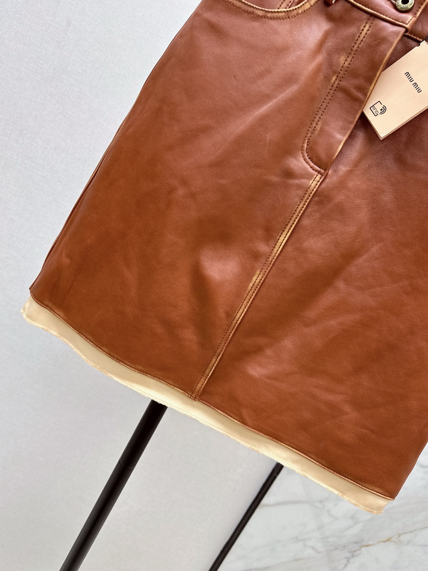 M*u 25fw leather skirt