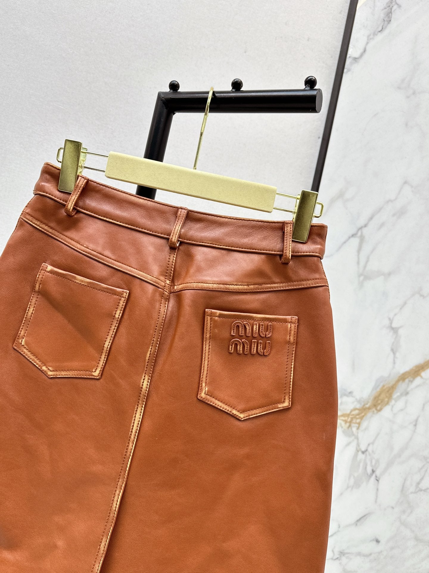 M*u 25fw leather skirt