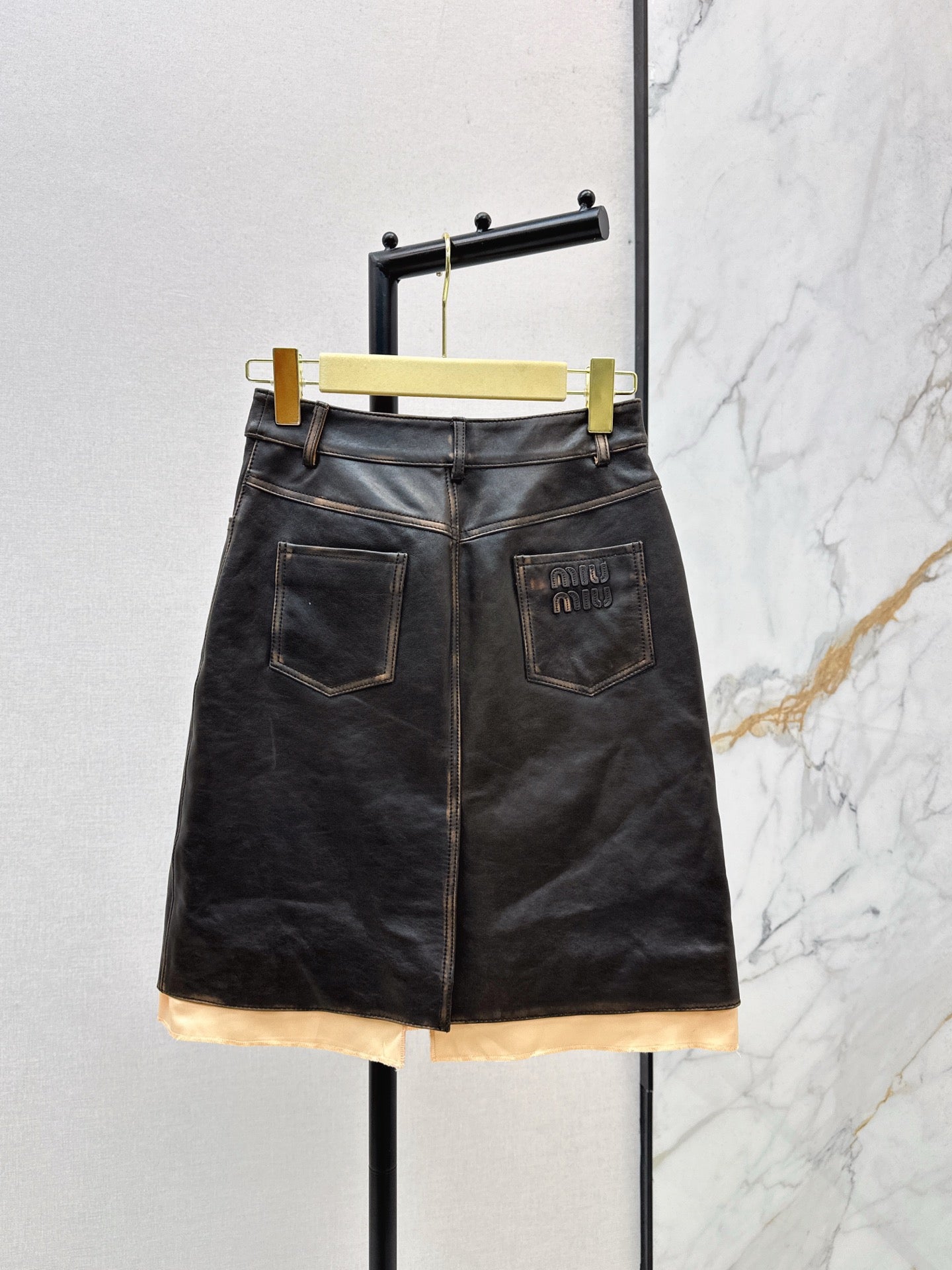 M*u 25fw leather skirt