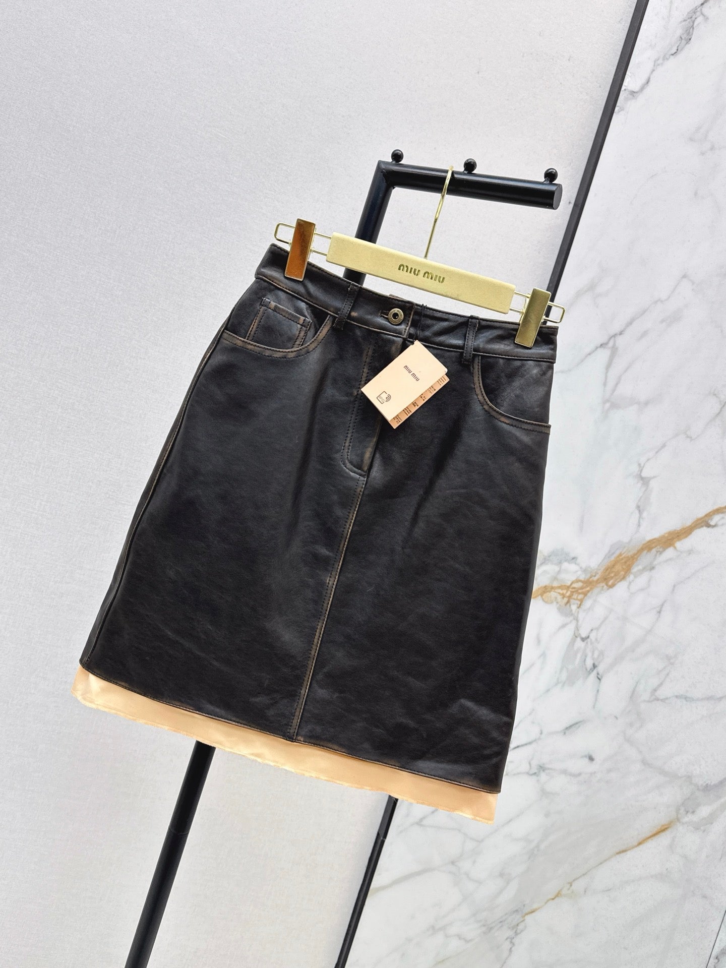M*u 25fw leather skirt