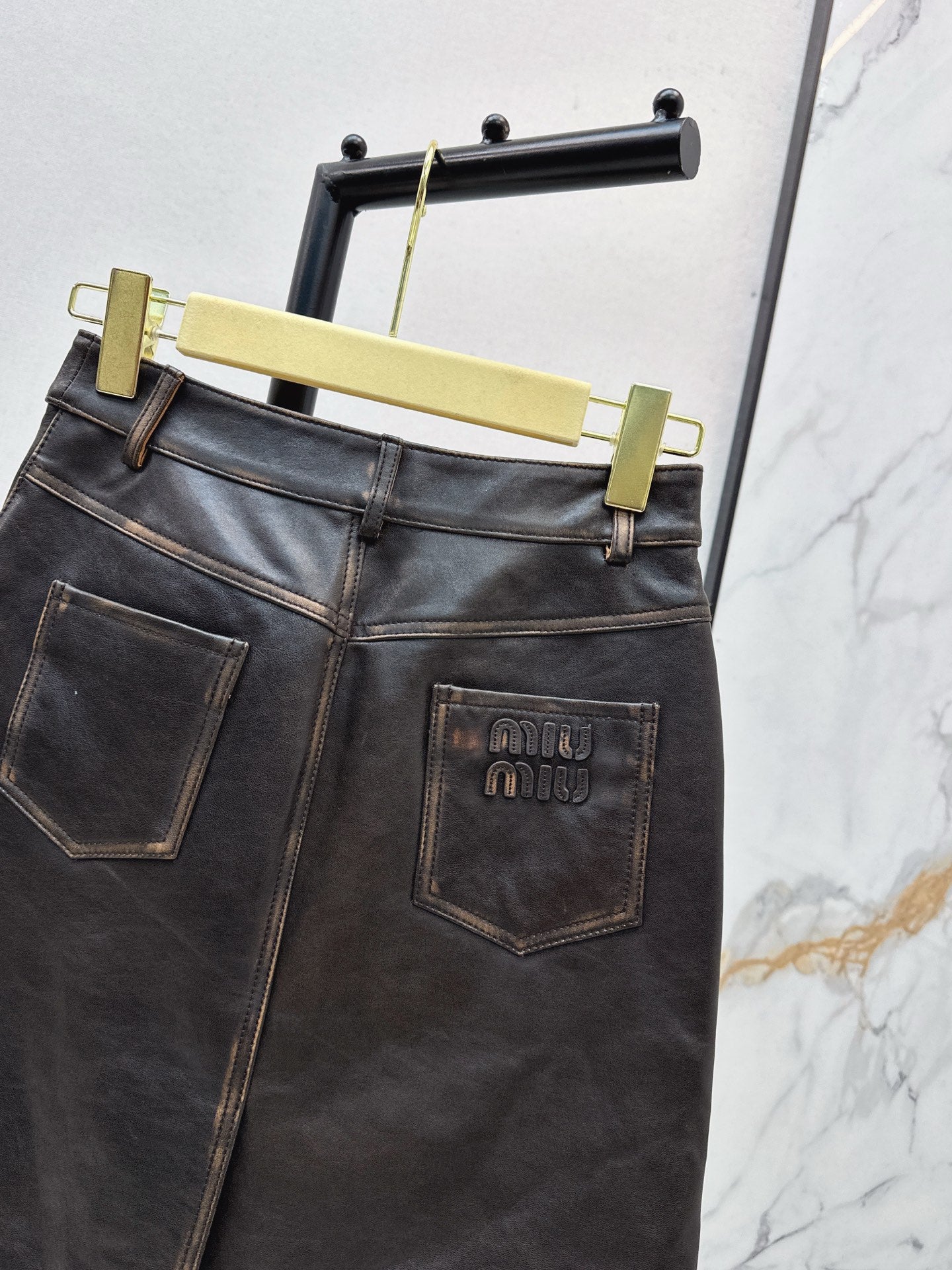 M*u 25fw leather skirt